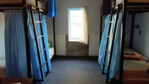 Postel nebo postele na pokoji v ubytování Local Hostel Amed