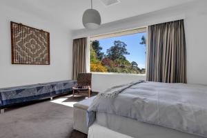 Postel nebo postele na pokoji v ubytování Dennarque Estate