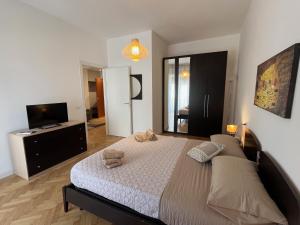 A bed or beds in a room at GABRY HOUSE