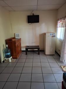 Μια τηλεόραση ή/και κέντρο ψυχαγωγίας στο Casita Escondida- El Salvador