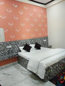Postel nebo postele na pokoji v ubytování Yash Paying Guest House