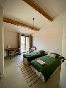 Postel nebo postele na pokoji v ubytování Felix - Maison d'hôtes