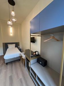Postel nebo postele na pokoji v ubytování Hotel Duca D'Aosta