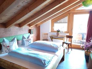 Postel nebo postele na pokoji v ubytování Haus Miele