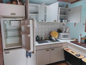 Kuchyň nebo kuchyňský kout v ubytování Livonia Matkamaja