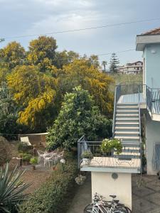 a group of bikes parked next to a house at Green paradise with Etna view in Mascali