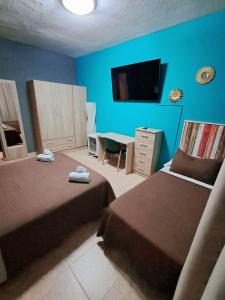Postel nebo postele na pokoji v ubytování Hostal Doña María + 37 fotografií