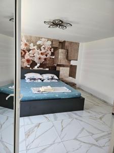 Postel nebo postele na pokoji v ubytování Casa Andreea