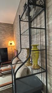 Ένα ή περισσότερα κρεβάτια σε δωμάτιο στο Boutique Suit 02