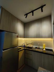 Кухня или мини-кухня в The Valley Homestay Setia Alam
 +8 фотографий