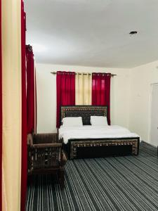 Postel nebo postele na pokoji v ubytování Green Villa Skardu