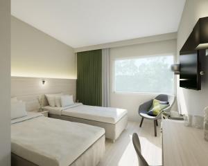 Postel nebo postele na pokoji v ubytování Best Western RC Hotel + 37 fotografií
