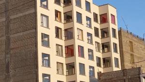 Budova, kde se apartmán nachází + 5 fotografií