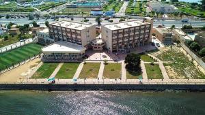 an aerial view of a building next to the water at بيت الشباب الاسماعيلية in Ismailia