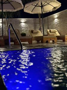 Bazén v ubytování Hotel Kroi nebo v jeho okolí