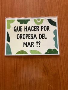 a sign on a door with a sign for aurger at Costa Marina III - 1ª línea de playa in El Borseral