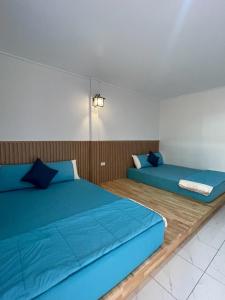 Postel nebo postele na pokoji v ubytování The kn kohlarn resort + 21 fotografií