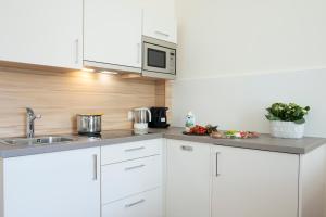A kitchen or kitchenette at Residence Diana