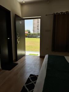 Postel nebo postele na pokoji v ubytování Hotel Sparkle Inn