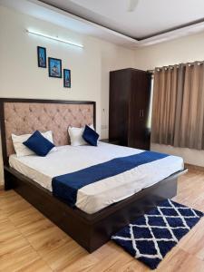 Postel nebo postele na pokoji v ubytování Hotel Sparkle Inn