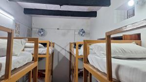 Postel nebo postele na pokoji v ubytování singh homestay