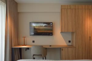TV a/nebo společenská místnost v ubytování Hotel De Zalm