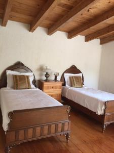 Postel nebo postele na pokoji v ubytování Finca Las Palmas