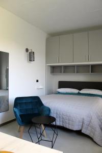 Postel nebo postele na pokoji v ubytování Inn Joy
