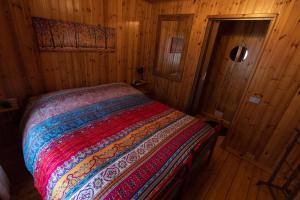 Кровать или кровати в номере Via molino 28
