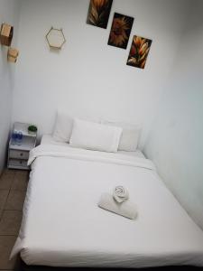 Postel nebo postele na pokoji v ubytování DaY COCON BUKIT BINTANG KL
