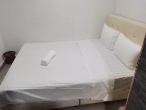 Postel nebo postele na pokoji v ubytování DaY COCON BUKIT BINTANG KL