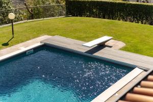 Bazén v ubytování Villa Principessa - Stunning Villa with Panoramic Lake Como Views nebo v jeho okolí + 37 fotografií