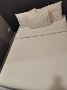 Postel nebo postele na pokoji v ubytování DaY COCON BUKIT BINTANG KL
