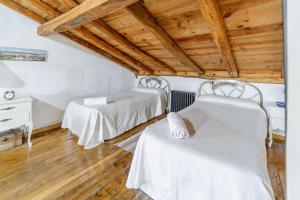 Posteľ alebo postele v izbe v ubytovaní Casa Los Aperos