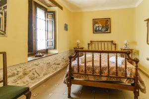 Posteľ alebo postele v izbe v ubytovaní Casa Los Aperos