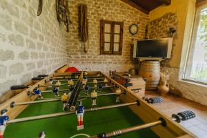 Televízia a/alebo spoločenská miestnosť v ubytovaní Casa Los Aperos