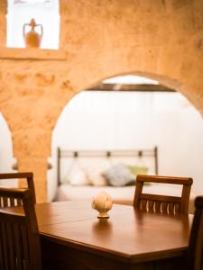 Ένα ή περισσότερα κρεβάτια σε δωμάτιο στο Trulli le Origini