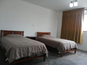 Postel nebo postele na pokoji v ubytování Casa Extremadura