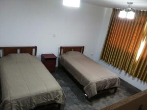 Postel nebo postele na pokoji v ubytování Casa Extremadura