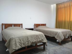 Postel nebo postele na pokoji v ubytování Casa Extremadura