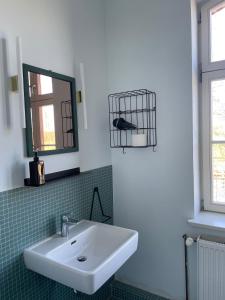 Ein Badezimmer in der Unterkunft An Den Wiesen Gasthaus am Finowkanal