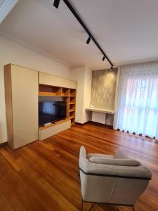 TV a/nebo společenská místnost v ubytování Apartamento Seymi
