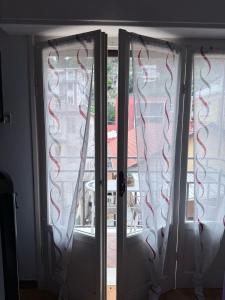 Posezení v ubytování Alassio Family Apartment - Balcone, Cucina, WiFi e Garage