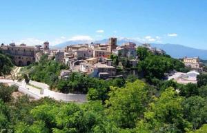 a town on a hill with trees and buildings at Casa Manilla in Lanciano