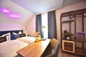 Postel nebo postele na pokoji v ubytování "Das Schlafzimmer" Erlebnis & Boutiquehotel - ehemals Hacienda Mexicana