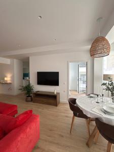 TV a/nebo společenská místnost v ubytování Apartamento ideal para vacaciones en la playa