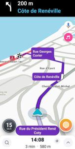 a screenshot of a cell phone screen with a tree at Appartement avec une place de parking in Fécamp