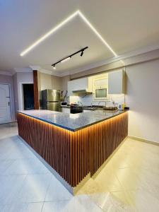 Kuchyň nebo kuchyňský kout v ubytování North coast Villa 2nd row from beach with 4 master rooms and 200m Garden standalone - Families only + 61 fotografií