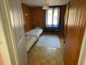 Postel nebo postele na pokoji v ubytování Gite de la Robella + 4 fotografie