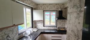 Kuchyň nebo kuchyňský kout v ubytování The Breeze Homestay + 13 fotografií